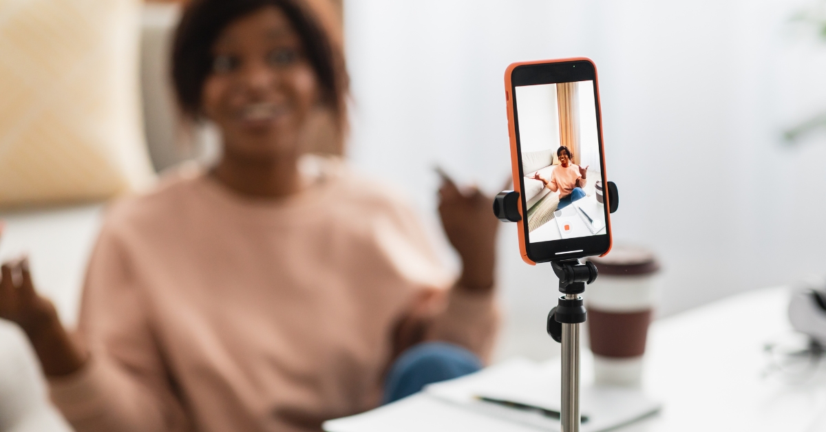woman filming a short-form video on her mobile device