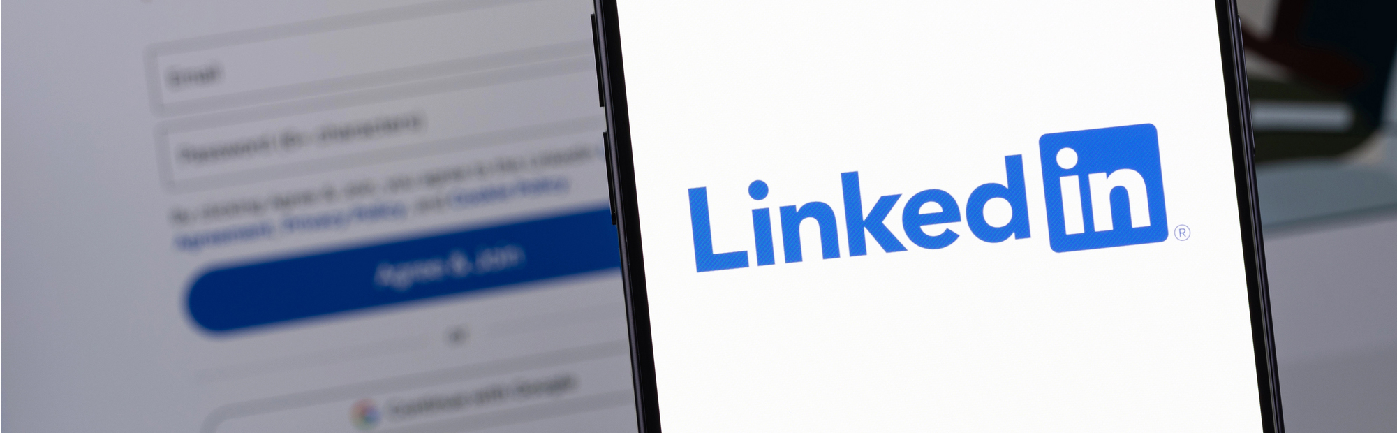 linkedinarticle Business man broadcasting negative messages via mobile device