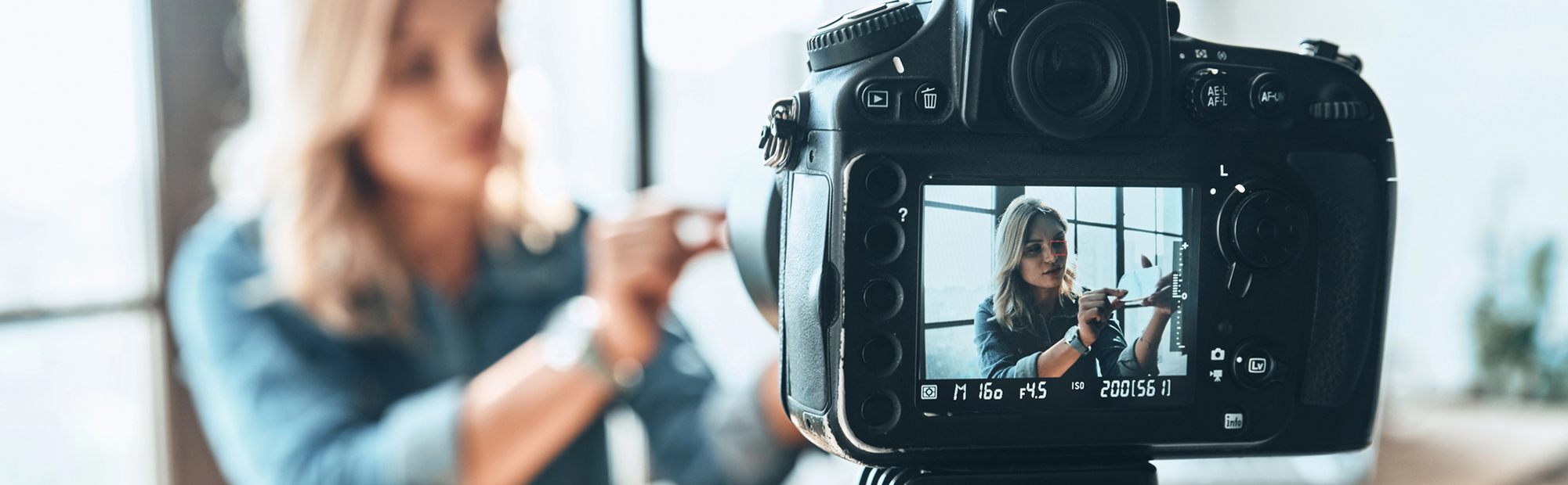 Business man broadcasting negative messages via mobile device